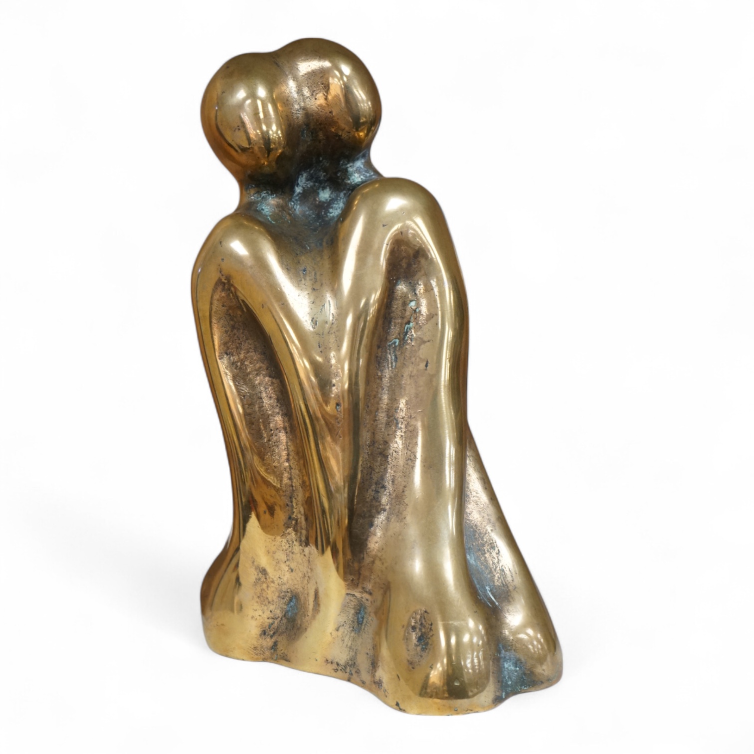 A modernist polished bronze sculpture, two entwined figures indistinctly signed, 23cm high